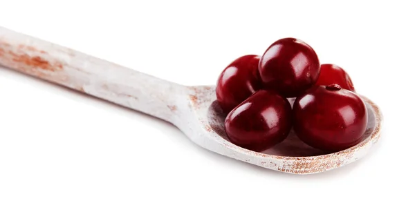 Cherry in wooden spoon isolated on white — Stock Photo, Image
