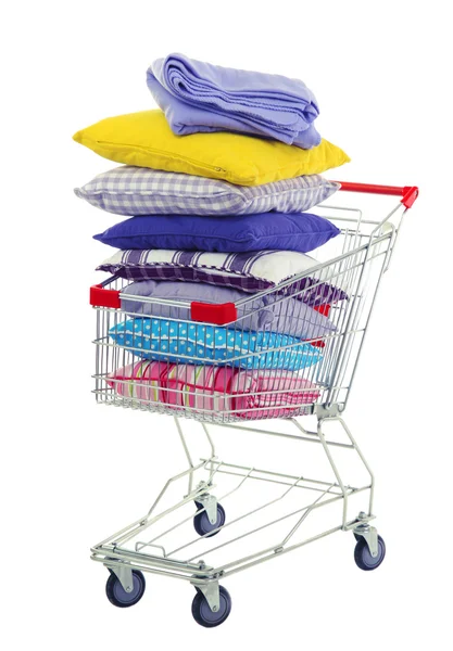 Shopping cart with pillows, isolated on white — Stock Photo, Image