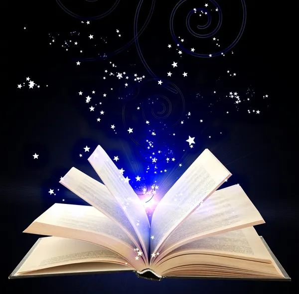 Open book with blue magic light and falling stars on dark background — Stock Photo, Image