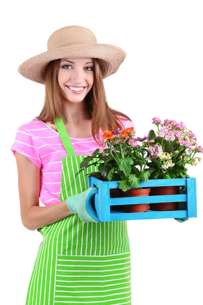 Jardineiro menina bonita com flores isoladas em branco — Fotografia de Stock