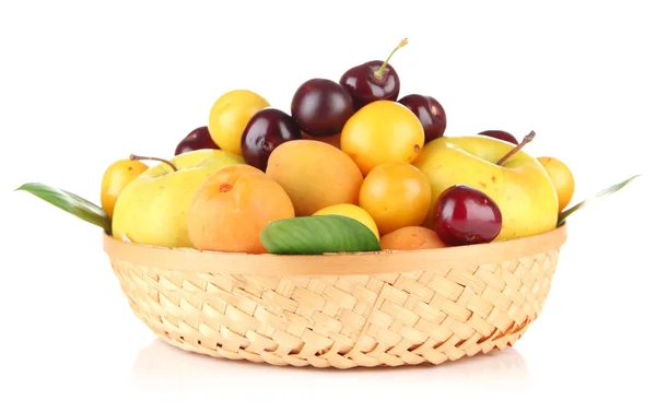 Bright summer fruits in basket isolated on white — Stock Photo, Image