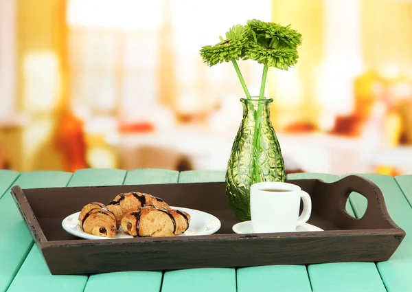 Wooden tray with breakfast, on bright background — Stock Photo, Image