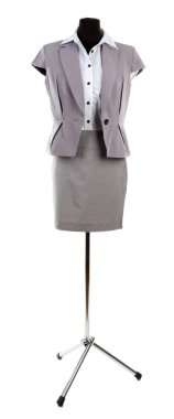 beyaz gömlek, gri ceket ve gri etek üzerine beyaz izole manken üzerinde