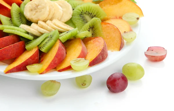 Assortment of sliced fruits on plate, isolated on white — Stock Photo, Image