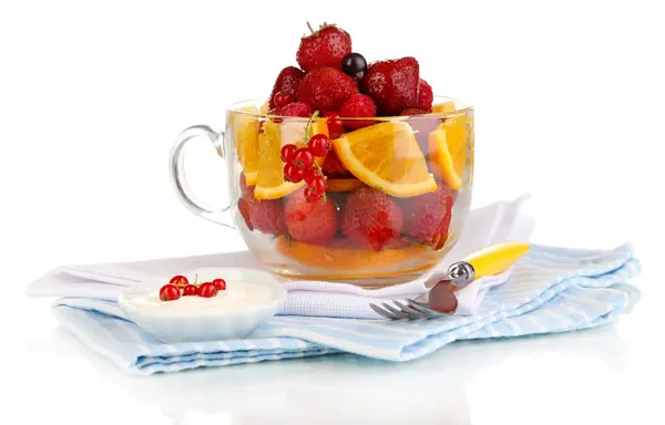Useful fruit salad in glass cup isolated on white — Stock Photo, Image