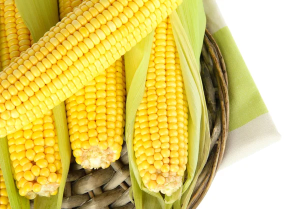 Crude corns on wicker tray isolated on white — Stock Photo, Image