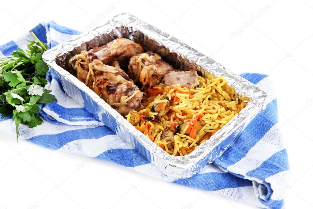 Food in box of foil on napkin isolated in white