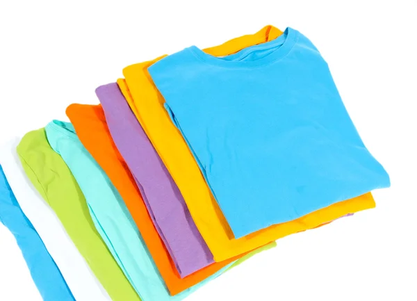 Camisas cuidadosamente dobladas aisladas en blanco —  Fotos de Stock