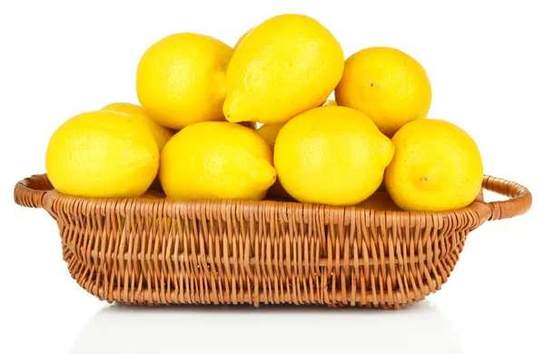 Ripe lemons in wicker basket isolated on white — Stock Photo, Image