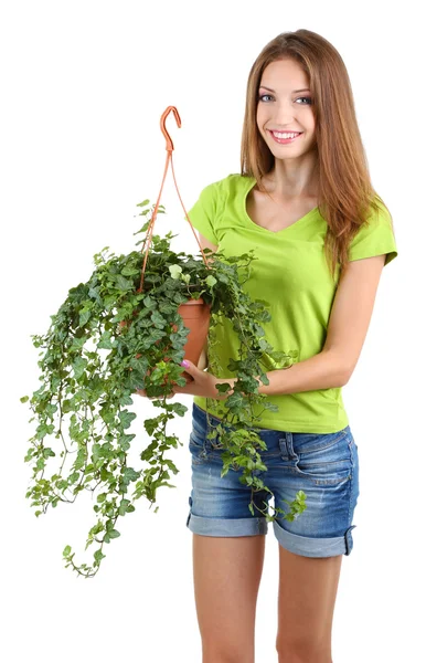 Mooi meisje met bloem in pot geïsoleerd op wit — Stockfoto