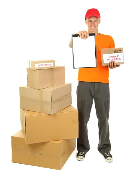 Young delivery man with parcels and clipboard, isolated on white — Stock Photo, Image