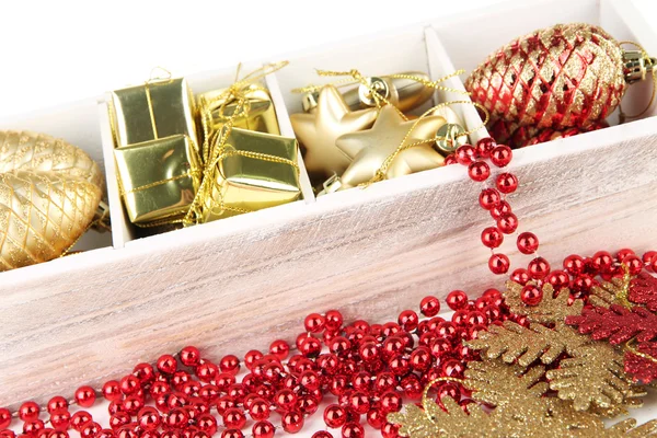 Wooden box filled with christmas decorations, isolated on white — Stock Photo, Image