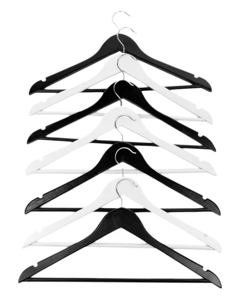 Perchas de ropa en blanco y negro aisladas en blanco — Foto de Stock