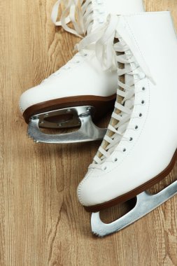 Figure skates on table close-up