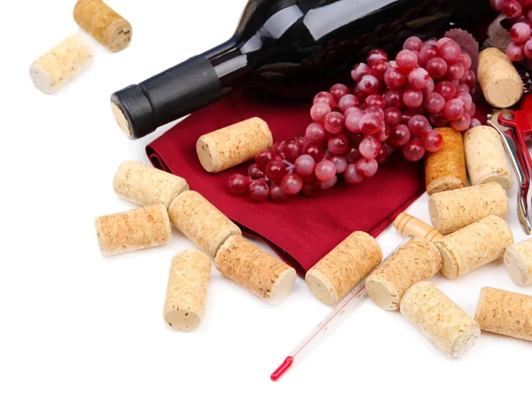 Bottle of wine, grapes and corks, isolated on white — Stock Photo, Image