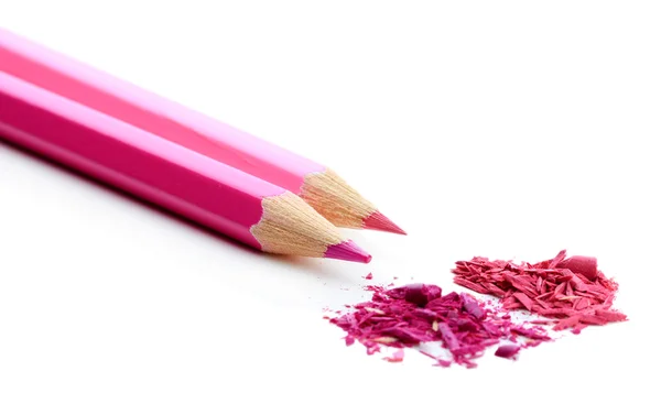 Pink pencils with sharpening shavings isolated on white — Stock Photo, Image