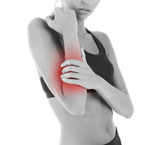 Mulher com dor de braço isolada no branco — Fotografia de Stock