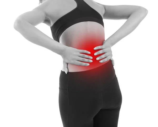 Lower back pain in woman isolated on white — Stock Photo, Image