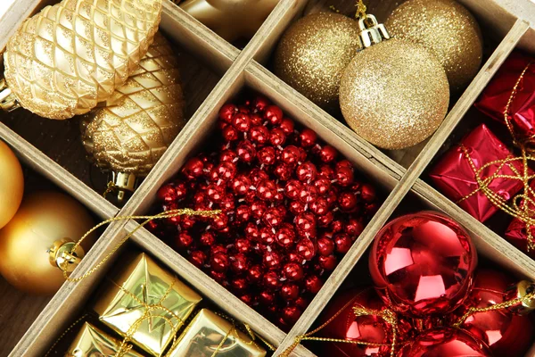 Wooden box filled with christmas decorations background — Stock Photo, Image