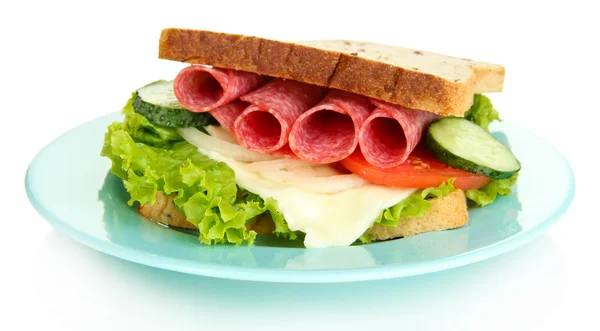 Tasty sandwich with salami sausage and vegetables on blue plate, isolated on white — Stock Photo, Image