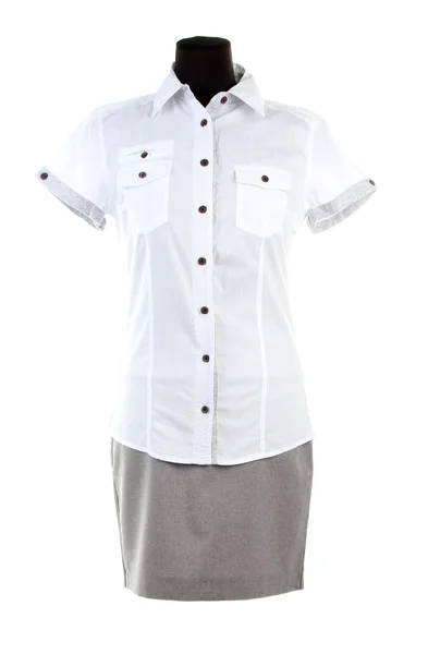 Jolie blouse et jupe grise sur mannequin, isolée sur blanc — Photo