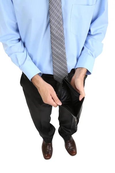 Homem de negócios mostrando sua bolsa vazia, isolado em branco — Fotografia de Stock