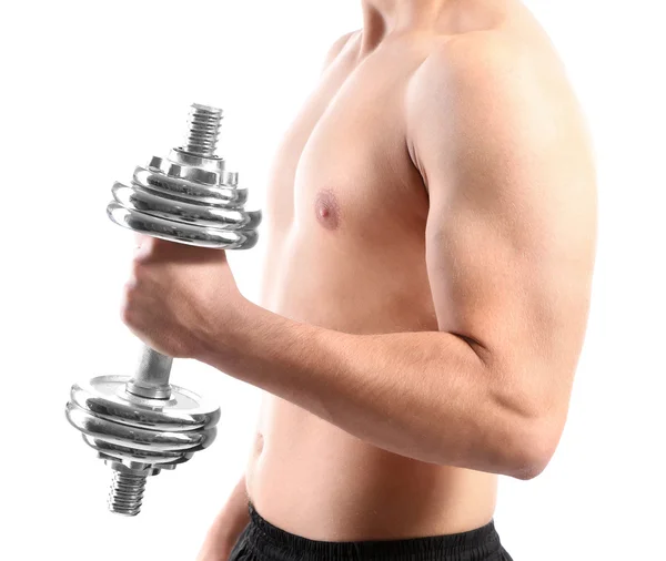 Handsome young muscular sportsman execute exercise with dumbbell, isolated on white — Stock Photo, Image