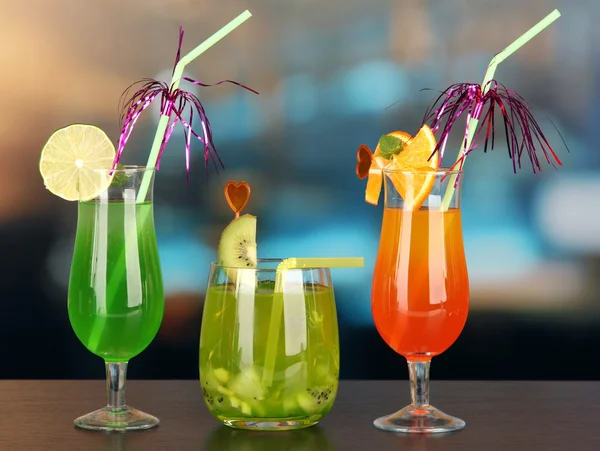 Set of different drinks on bright background — Stock Photo, Image