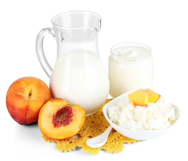 Fresh dairy products with peaches isolated on white — Stock Photo, Image