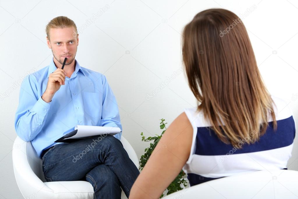 Woman with problem on reception for psychologist
