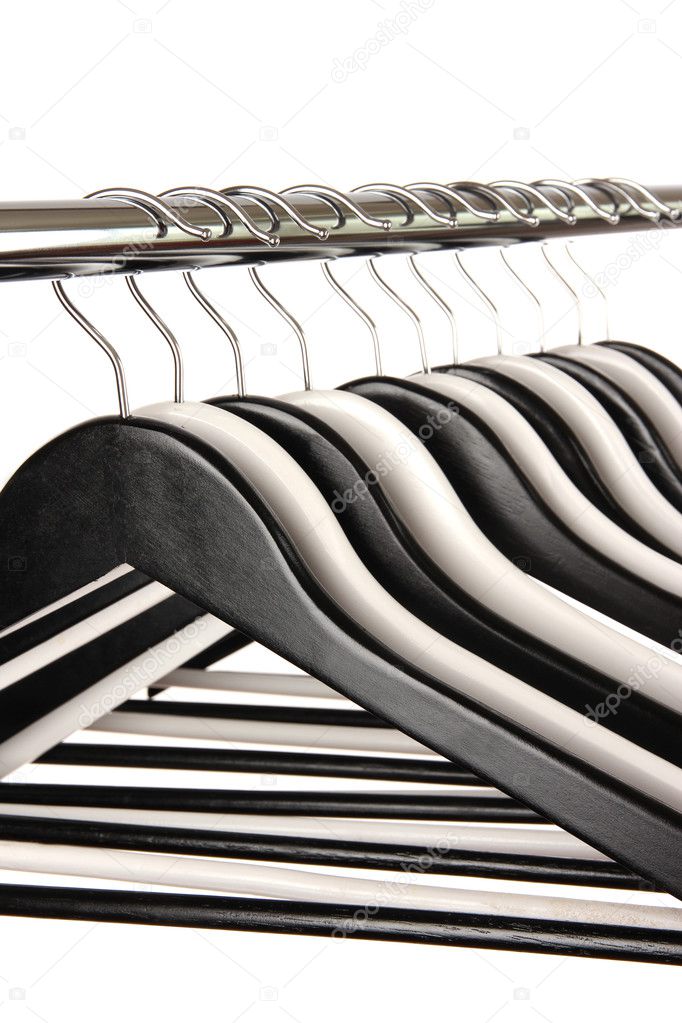 Black and white clothes hangers isolated on white