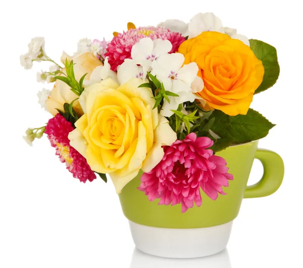 Beautiful bouquet of bright flowers in color mug, isolated on white — Stock Photo, Image