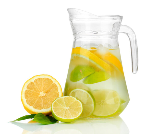 Cold water with lime, lemon and ice in pitcher isolated on white