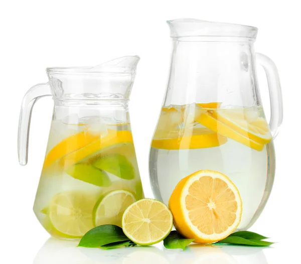 Cold water with lime, lemon and ice in pitchers isolated on white — Stock Photo, Image