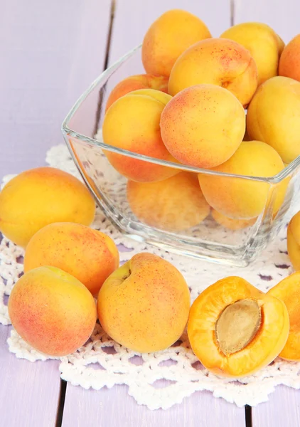 Fresh natural apricot in bowl on wooden table — Stock Photo, Image