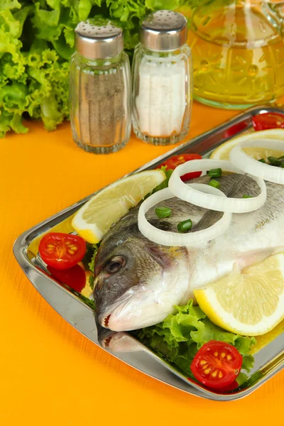 Dorado fish on table close-up — Stock Photo, Image