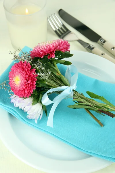 Festive dining table setting with flowers isolated on white — Stock Photo, Image