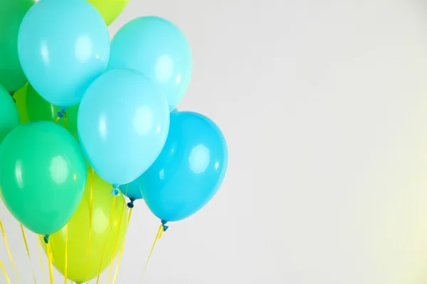 Colorful balloons on color background — Stock Photo, Image