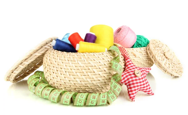 Wicker basket with accessories for needlework isolated on white — Stock Photo, Image