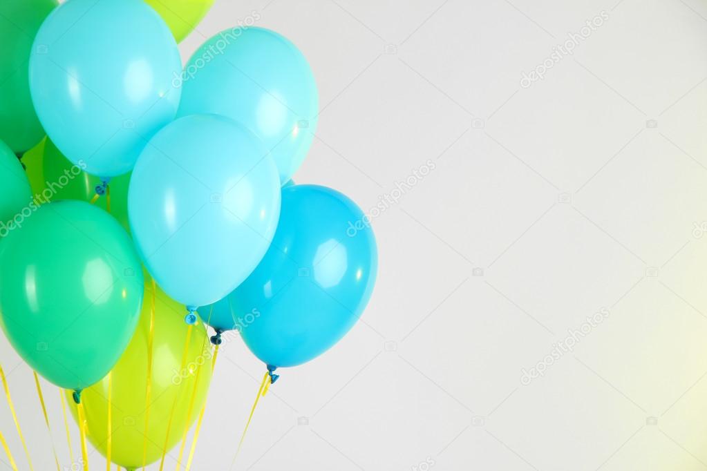 Colorful balloons on color background