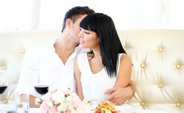 Beautiful couple having romantic dinner at restaurant — Stock Photo, Image