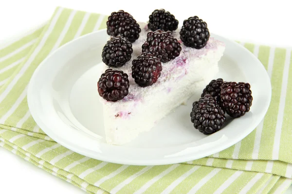 Cheesecake with fresh berries on white plate closeup — Stock Photo, Image