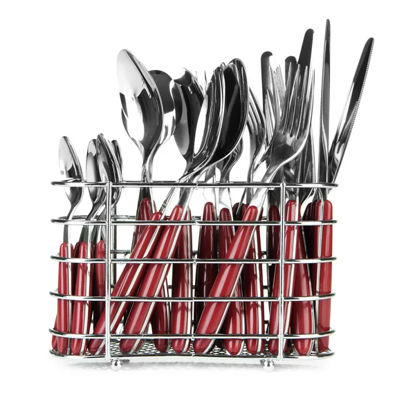 Cubiertos de cocina, cuchillos, tenedores y cucharas en soporte de metal, aislados en blanco —  Fotos de Stock