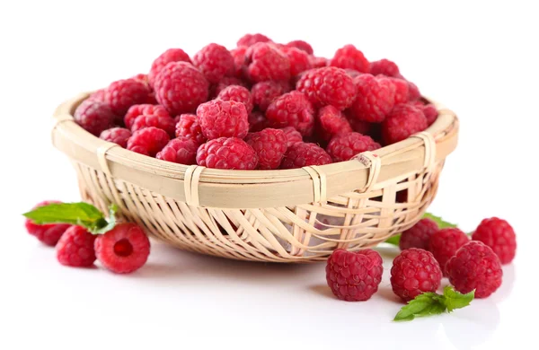 Ripe sweet raspberries in basket, isolated on white — Stock Photo, Image