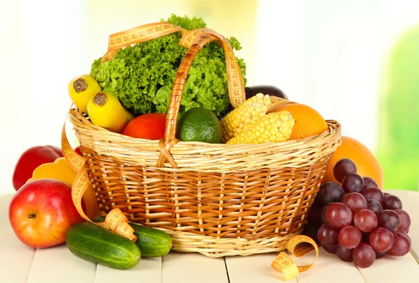 Fresh vegetables on table on light background — Stock Photo, Image