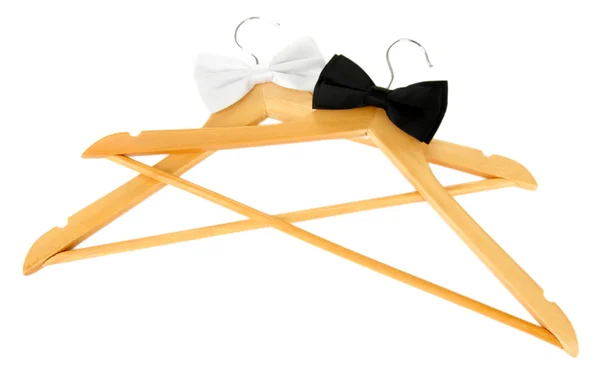 Black and white bow ties on wooden hangers, isolated on white — Stock Photo, Image