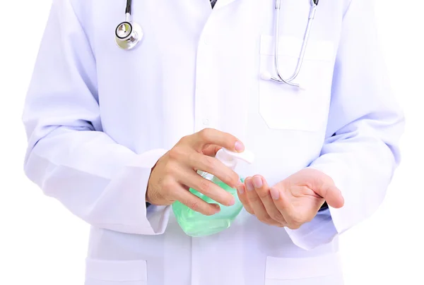 Lekarz stosujący dozownik dezynfekcyjny — Zdjęcie stockowe