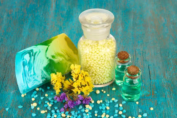 Hand made soaps with sea salt on wooden table close-up — Stock Photo, Image