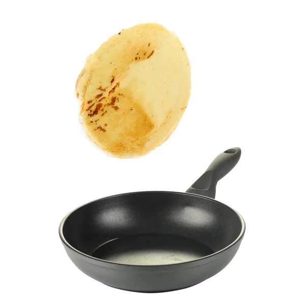 Koekenpan met vliegende pannenkoek — Stockfoto