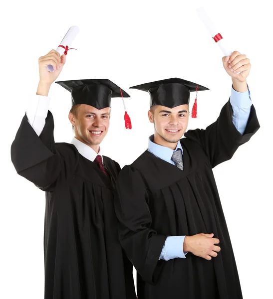 Δύο ευτυχής φοιτητές που αποφοιτούν απομονωθεί σε λευκό — Φωτογραφία Αρχείου